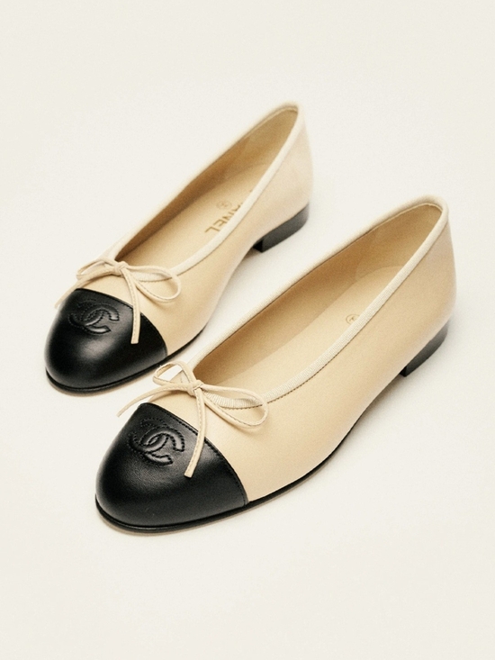 CHANEL Shoes - CHANEL Two-Tone Leather Cap-Toe Ballet Flats in Beige and Black